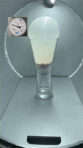 Balloon Inside a Glass VS Vacuum Chamber