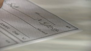 What is check washing? These tips can help you protect against this savings-draining scam