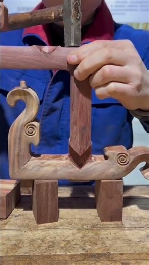 installation of a piece of wood that has been made into a base using a hammering method #wood