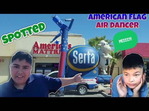 Spotted American Flag Air Dancer with a Serta Sheep Sidekick!