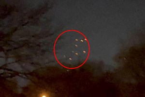 Shocked dad & son film '10 dancing UFO's' above their home