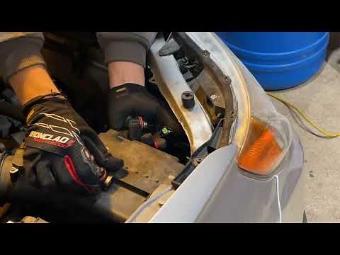 How To Replace The Headlight Bulb On A 2010 Subaru Forester