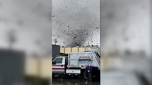 Watch: Rare tornado tosses debris near Los Angeles