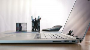 Man typing on a laptop in the desk - Free Stock Video
