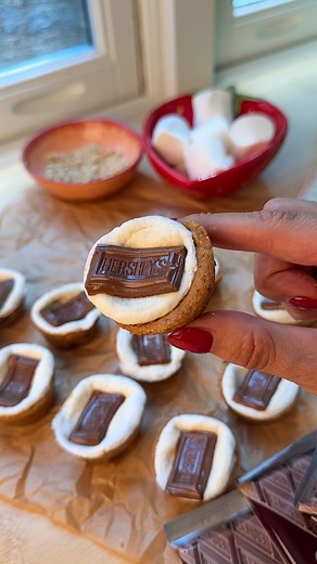 Mallory Harr on Instagram: "Brown Butter S’mores Cookie Cups 🍪 These are the ultimate bite-sized summer treat! I start with my brown butter cookie dough, pressed into a greased mini muffin pan. After a quick partial bake, I press down the centers with a tablespoon, then fill each with crushed grahams and half a marshmallow. Bake again until golden, then top each warm cookie cup with a Hershey’s square. Gooey, toasty, chocolatey perfection—no campfire required 🔥 Comment “recipe” for the full wr