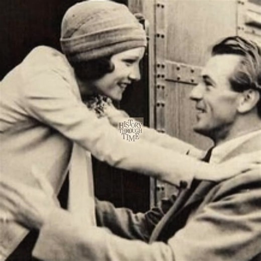 "Gary Cooper and his girlfriend, Lupe Vélez, are photographed at the Los Angeles train station in 1930, a moment that reflects the golden charm of early Hollywood romance. At the time, Cooper was gaining acclaim for his breakout role in The Virginian (1929), while Vélez, known as the ‘Mexican Spitfire,’ had already captivated audiences with her magnetic presence in both silent films and early talkies. Their relationship, though brief, was marked by genuine affection and admiration, captured here