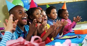 Kids clapping their hands during birthday party at home 4k
