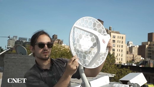 NYC Mesh is one of the largest volunteer-based, community-supported networks in the world, providing broadband connections to thousands for a small suggested donation. Its aim is to bridge the digital divide by connecting underserved communities in New York, one rooftop at a time. | CNET