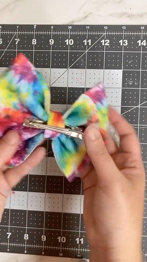 How I add the bullet fabric bows to clips! #hairbows #bows #diy #hairbowtutorial #diyhairbow #bulletfabric #bulletbows #hairclips #fabricbows | Mommy Crafts A lot
