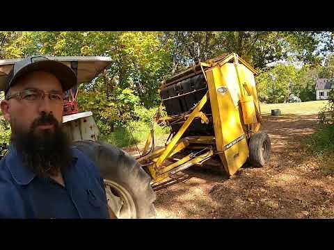The Vermeer 605-D Round Baler Behind the 4610 Ford Tractor...