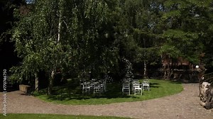 round arch for a wedding ceremony with decor and flowers