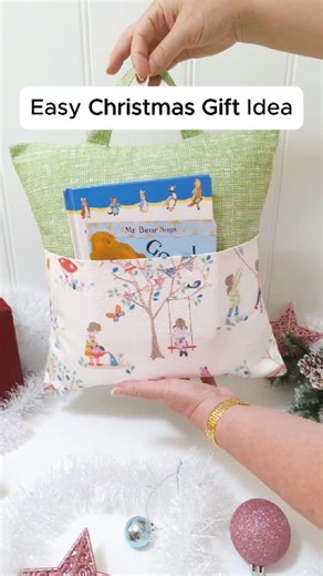 Easy Sewing Patterns for Beginners on Instagram: "Easy Gift Idea🎄 If you’re after a sweet Christmas present for a little reader, this book pillow is such a fun one to make. Sew the pillow, pop a favourite book in the front pocket, and you’ve got a cosy, thoughtful gift ready to go. Want to make one too? Pattern is available in my shop, link in bio.💛"