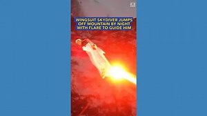 Wingsuit skydiver jumps off mountain