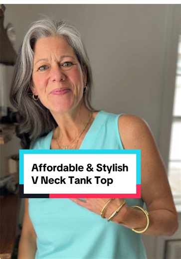 I adore the relaxed loose fit of this tank top. It comes in several styles and runs true to size. #tanktop #sleevelesstops #springfashion #fashionover50