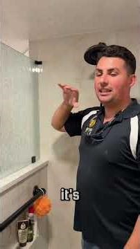 Modern shower makeover hex floor, large tile walls & rain glass. Clean + low maintenance! #bathremo