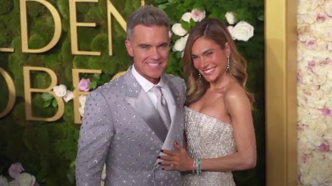 WATCH: Robbie Williams and Ayda Field stunning in silver at 2025 Golden Globes