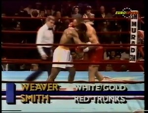 Rematch between Bonecrusher Smith and Mike Weaver. In their first fight, Bonecrusher ambushes the former champ in the first round. Can Weaver turn the trick in the rematch or does Crusher simply have his number? | Boxing Depot