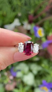 213 reactions · 49 comments | Ruby ring > ruby slippers ❤️⁠ ⁠ This 2.05-carat oval ruby looks beyond stunning set in 14-karat rose gold prongs between two .50-carat oval diamonds on a platinum band⁠ ⁠ This beauty would make the most amazing engagement ring, right-hand ring, or even push present for your July baby??✨ We can't wait to add it to your wishlist! | Bailey's Fine Jewelry | Facebook