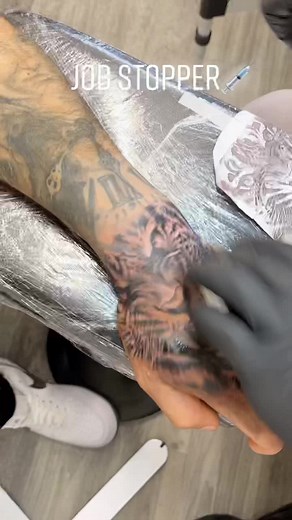 Unique Tiger Hand Tattoo Design