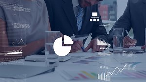 Business people analyzing documents with financial data processing animation overlaid | Premium Stock Video Footage