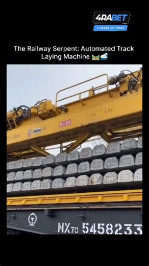 World_War on Instagram: "This video shows a large piece of heavy machinery, specifically a railway track renewal or track laying machine, in operation on a rail line. This specialized equipment is used for maintenance and construction activities on railway infrastructure. It appears to be in the process of replacing or maintaining the existing track structure, which includes the rails, sleepers (ties), and ballast (crushed stone). The machine automates many of the labor-intensive tasks involved