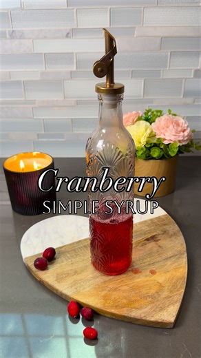 Stephanie, Taylor & Elisa on Instagram: "Leftover cranberries in your freezer? 👀🍒 Turn them into this easy homemade cranberry simple syrup! Perfect for cocktails, mocktails, teas, and desserts. Save this for later 🤍 Recipe: ▢1 cup (240 g) Water ▢1 cup (200 g) Granulated Sugar ▢1 cup Fresh or Frozen Cranberries Instructions: Pour your measured water and sugar into a saucepan and heat on medium. Cook, stirring the mixture until your sugar has completely dissolved. Add cranberries and continue h