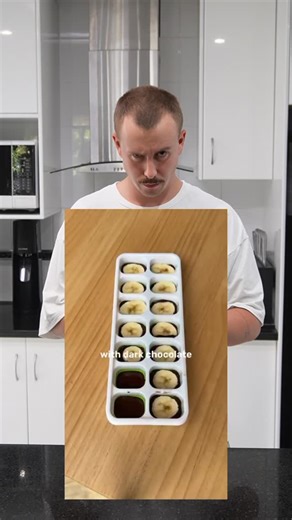 Ben Moore | Online Coach on Instagram: "Smash or Trash Healthy snickers bars Ep. 109 Ingredients (makes 12 little bars) 1 ripe banana 2.5 oz dark chocolate Peanut butter to taste Peanuts to taste How to make them 👉🏻Melt the dark chocolate and pour a thin layer into each slot of an ice cube tray. 👉🏻Add a slice of banana on top. 👉🏻Add a bit of peanut butter. 👉🏻Sprinkle each with 3 little peanuts. 👉🏻Cover with more melted chocolate to fill each slot. 👉🏻Freeze for at least 4 hours. 👉🏻P