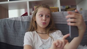 Little Girl Makes Selfie Photo On Stock Footage Video (100% Royalty-free) 23854324 | Shutterstock