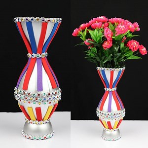 631K views · 10K reactions | how to make a flower vase with plastic bottle Cómo hacer un jarrón con una botella de plástico. #diy #crafts #recycling #manualidades | Crafts Dude | Facebook