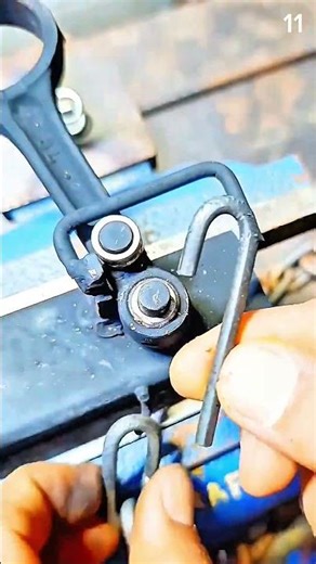 Bending metal wire around jig post for shaping