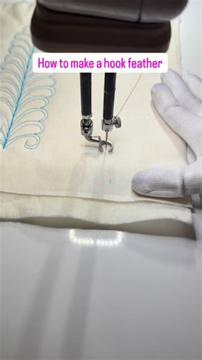 This is a great beginner friendly free motion feather. No backtracking and trying to stitch over previous lines. The hook feather. Give it a try. #fmq #freemotionquilting #quilt #handguidedquilting | Mary-Go-Round Quilts
