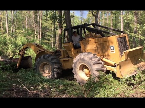 Caterpillar 518 Skidder Pulling a Huge Pine Log!