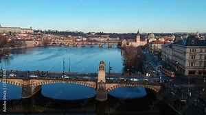 Bridge aerial view European city Prague footage Czech Republic. view Praha aerial survey flight over rooftops. survey on the Vltava river. Prag house, building central Europe city. Prague drone shot