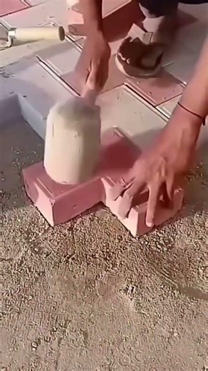 The process of installing a brick on the building area by a handyman evenly