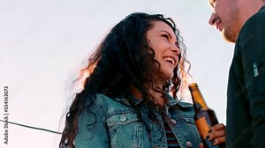 Love, couple and dance at party, drink and celebration for romance, bonding and fun together. Romantic man and woman dancing at event, festival or loving to relax, beer and alcohol outdoor for summer