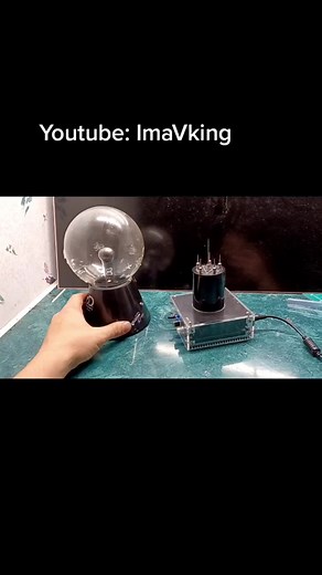Tesla Coil and Plasma Ball Resonating at 20,000 Hertz