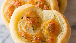 Amazingly simple and delicious 6-Ingredient Cheesy Garlic Herb Palmiers, just in time for the holidays. http://www.aspicyperspective.com/cheesy-garlic-herb-palmiers/ | A SPICY PERSPECTIVE