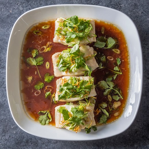 Oven-Steamed Fish with Scallions and Ginger | America's Test Kitchen