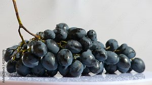 Camera slide and spin around bunch of grape