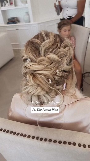 My favorite updo to create! Perfect for our romantic brides 🤍✨ shop, the Pismo pins and all bridal accessories through the link in our bio✨ #weddinghair #bridalhairaccessories #2024bride
