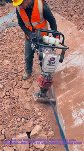Construction Site Tool: Using a Plate Compactor to Compact Loose Dirt