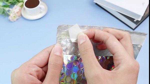 Ireer 50 Pcs Holographic Bubble Mailers, 7 x 11 Inch Metallic Glitter Bubble Mailers Waterproof Self Adhesive Shipping Bags Padded Envelopes for Mailing, Packing, Small Business