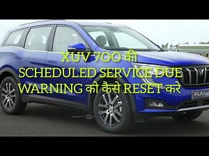 How to reset the service in the Mahindra XUV700?