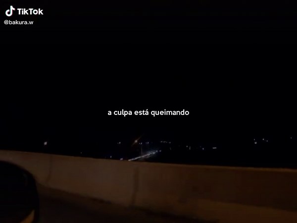 Nighttime Highway Drive with Vehicles and Text Overlays