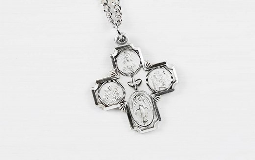 22K views · 635 reactions | It's traditional for Catholics to wear religious medals, and the 4-way medal is one of the most popular because it combines four of the most essential ones. Watch to learn more! Shop the 4-way medal here: https://goo.gl/0nQU6W. | The Catholic Company | Facebook