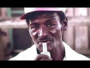 He's Blowing In A Bottle Creating Mississippi Delta Blues.