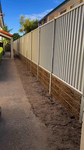 This weeks install. Lysaght smartascreen on top concrete sleeper retaining | Edge Fencing