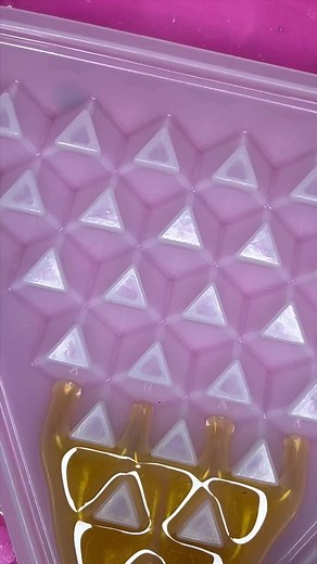 Experience the captivating beauty of epoxy resin flowing over a...