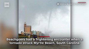 Beachgoers scramble as tornado moves up popular US beach