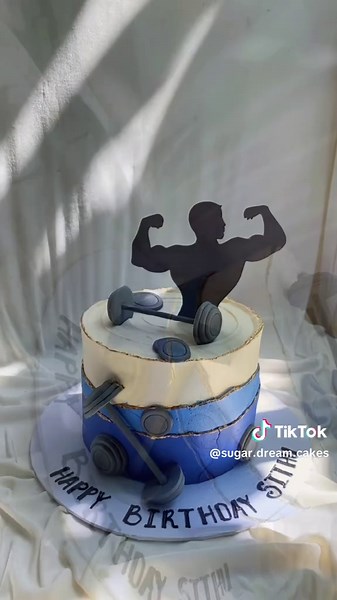 ✨ Where muscles meet buttercream 💪🎂 Created this power-packed gym-themed cake for a real fitness champ! From the dumbbells to the flexing silhouette, every detail is handcrafted to celebrate strength, dedication, and those everyday gains. Because even the strongest deserve a slice of sweetness on their special day 🏋️‍♂️✨ Fuel your body at the gym and your soul with cake 💫✨ ✨ Thank you for choosing us to be part of your special moments!✨ ✨ DM to order your custom edible print cake Now with us